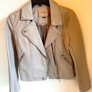 Fitted light tan leather Blank NYC jacket.
